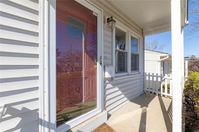 doorway to property with covered porch