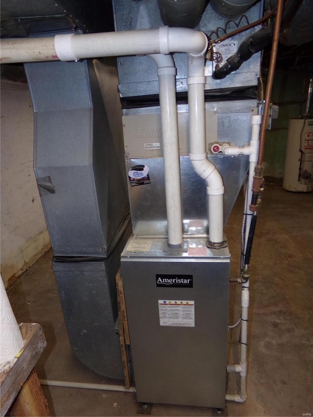 utility room with water heater