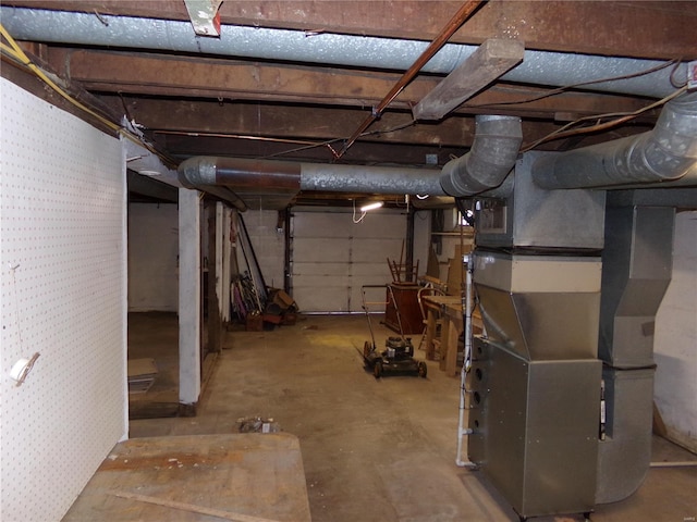 basement featuring heating unit