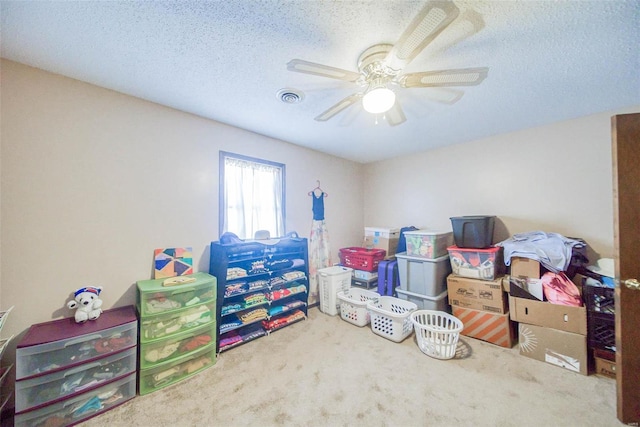 storage area featuring ceiling fan