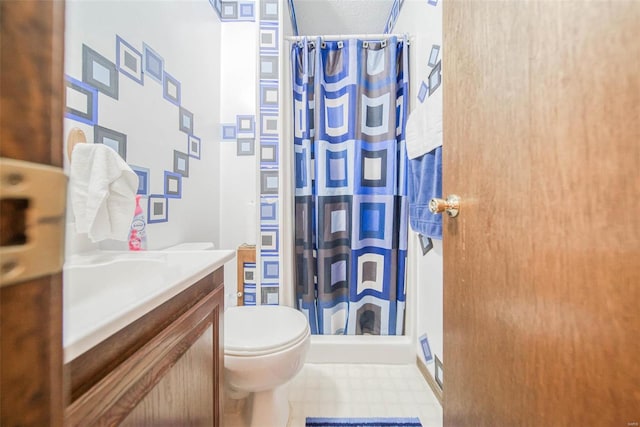 bathroom featuring a shower with curtain, toilet, and vanity