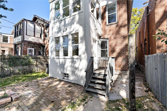 rear view of property with a patio