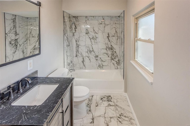 full bathroom featuring vanity, tiled shower / bath combo, and toilet