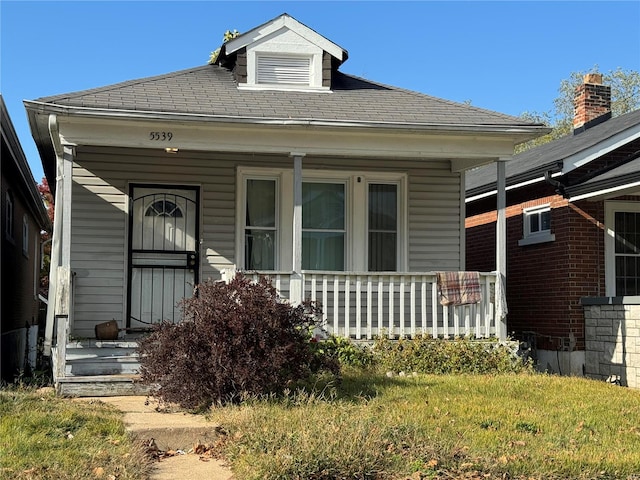 bungalow-style house featuring covered porch