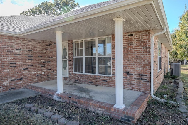 doorway to property featuring central AC