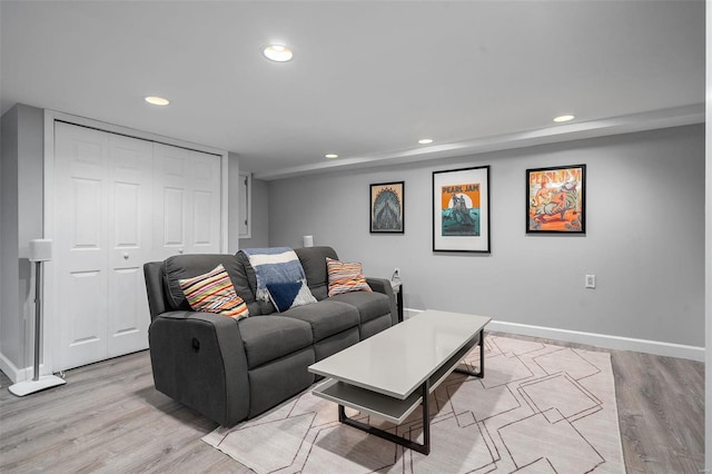 living room with light hardwood / wood-style floors