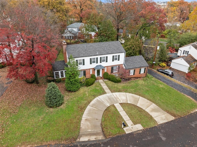 view of front of property with a front lawn