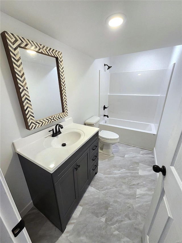 full bathroom featuring shower / bathtub combination, vanity, and toilet