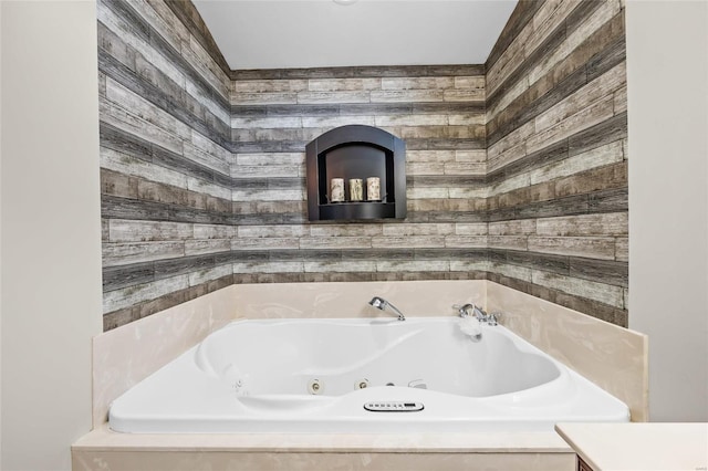 bathroom with wooden walls and a tub