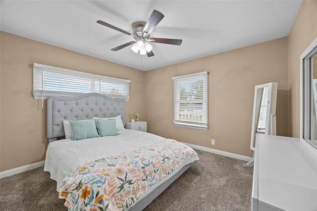 bedroom with ceiling fan and carpet floors