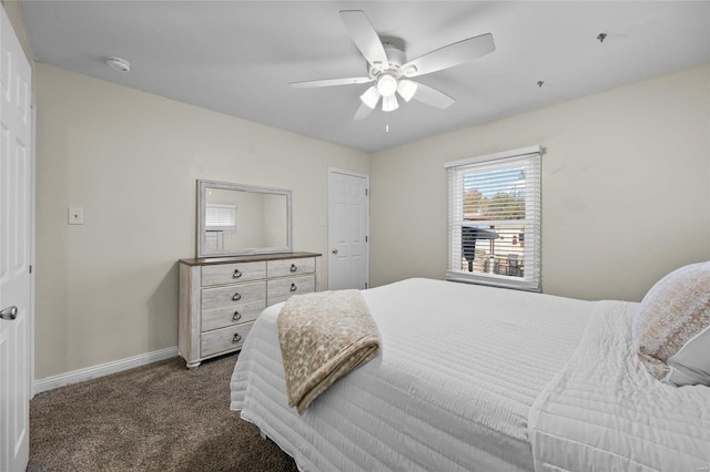 bedroom featuring ceiling fan and dark colored carpet