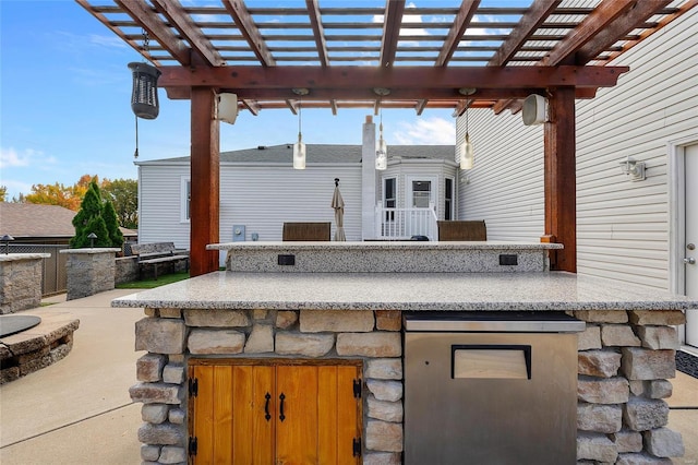 view of patio featuring a pergola