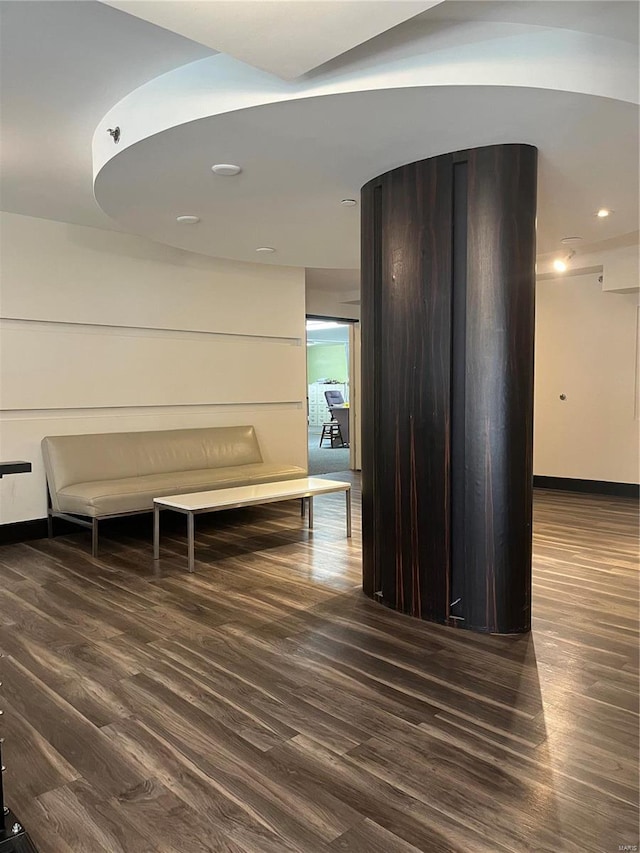 corridor featuring dark hardwood / wood-style floors