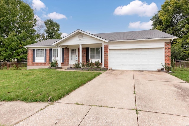 single story home featuring a front lawn and a garage