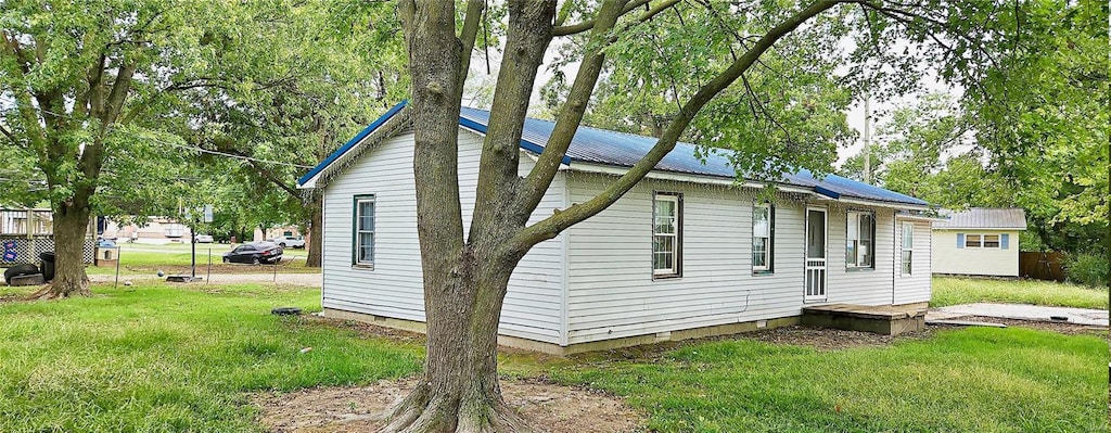 exterior space with a front lawn