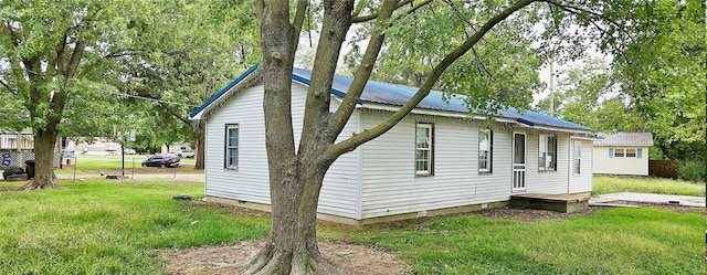 exterior space with a front lawn