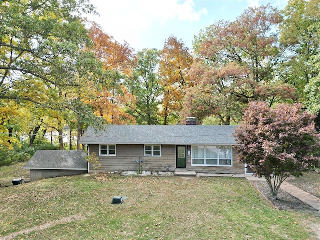 view of front of home featuring a front yard