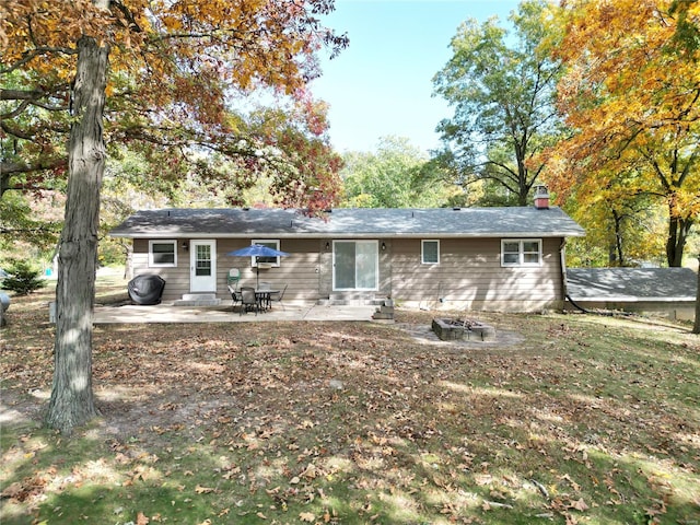 rear view of house with a patio area