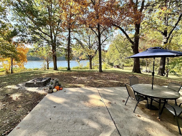 view of patio featuring a water view