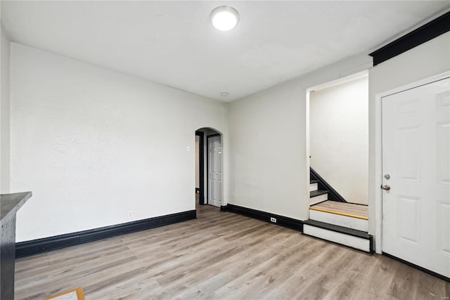 spare room with light hardwood / wood-style flooring