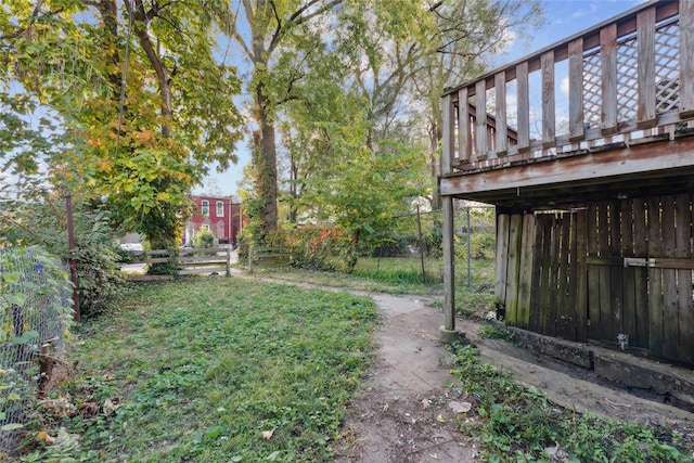 view of yard with a wooden deck