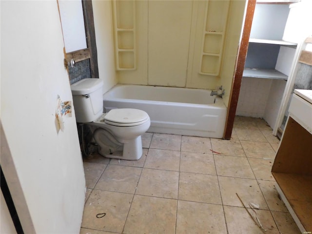 bathroom featuring vanity, toilet, and tile patterned floors