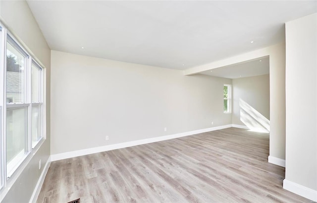 empty room with light wood-type flooring