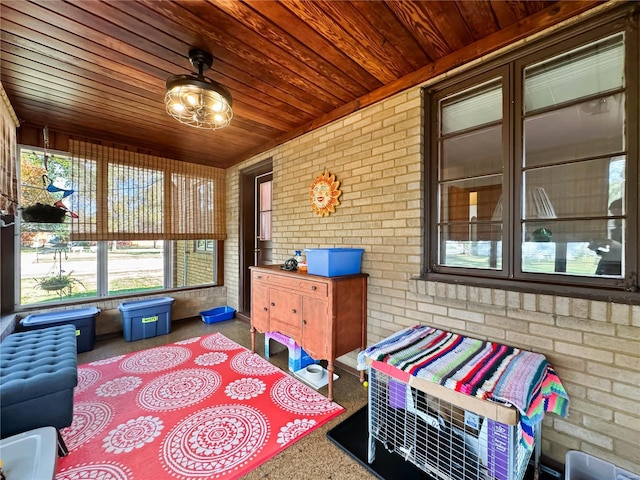 sunroom with wooden ceiling