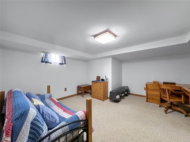 bedroom featuring light carpet