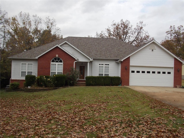 ranch-style house with a garage and a front yard