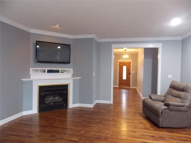 living room with wood-type flooring and crown molding