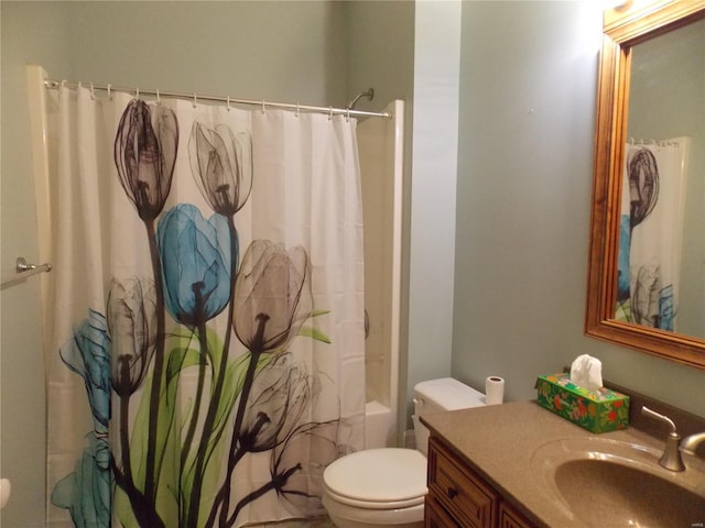 full bathroom featuring vanity, toilet, and shower / tub combo