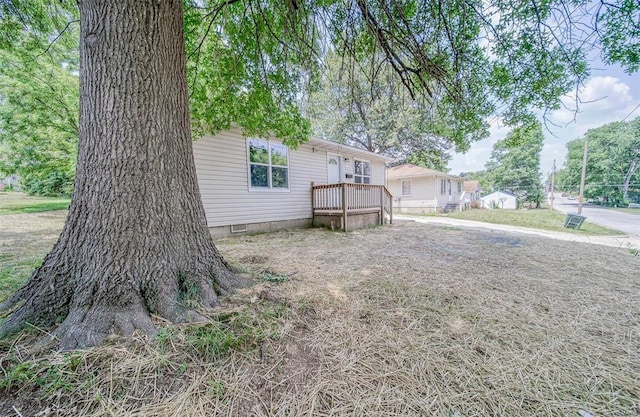 exterior space featuring a deck