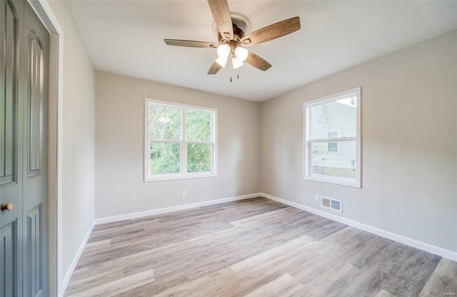 unfurnished room with light hardwood / wood-style floors and ceiling fan