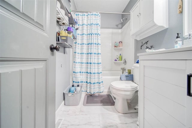 bathroom with shower / bath combo with shower curtain and toilet