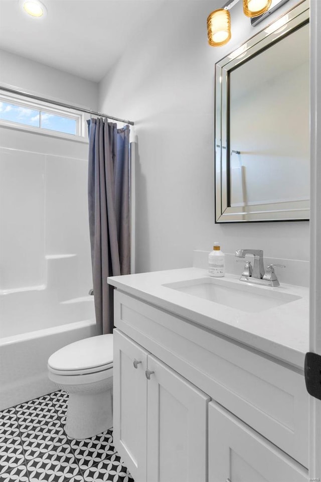 full bathroom with vanity, toilet, tile patterned floors, and shower / bathtub combination with curtain