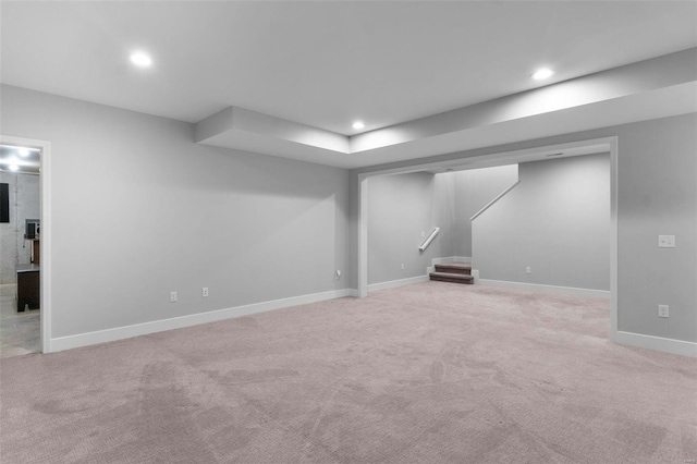 basement with light carpet