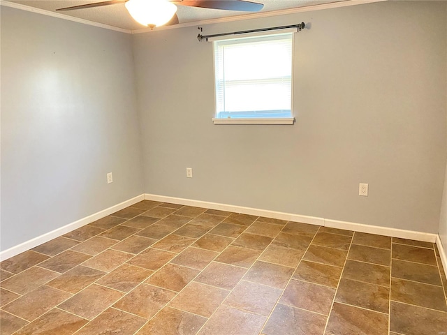 spare room with ceiling fan and ornamental molding