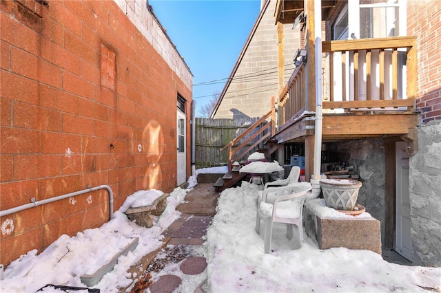 view of snow covered patio