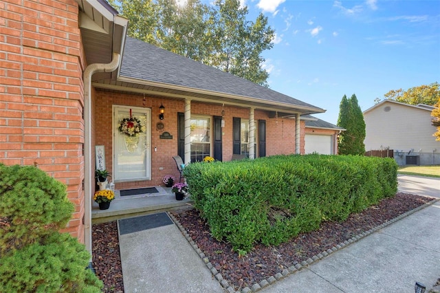 view of front of property featuring central AC unit and covered porch