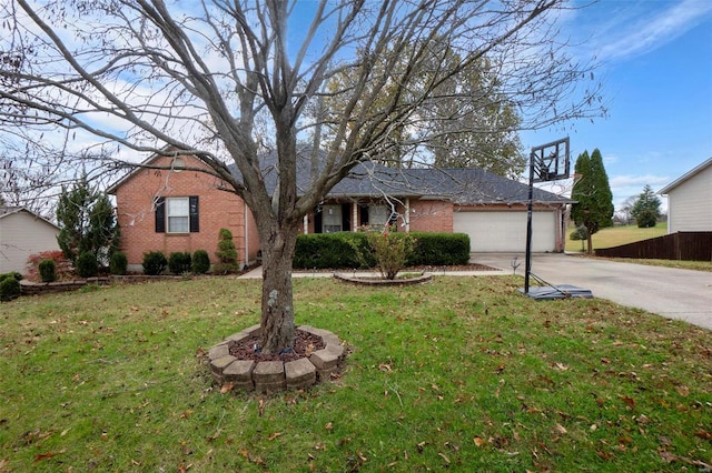 single story home featuring a garage and a front lawn