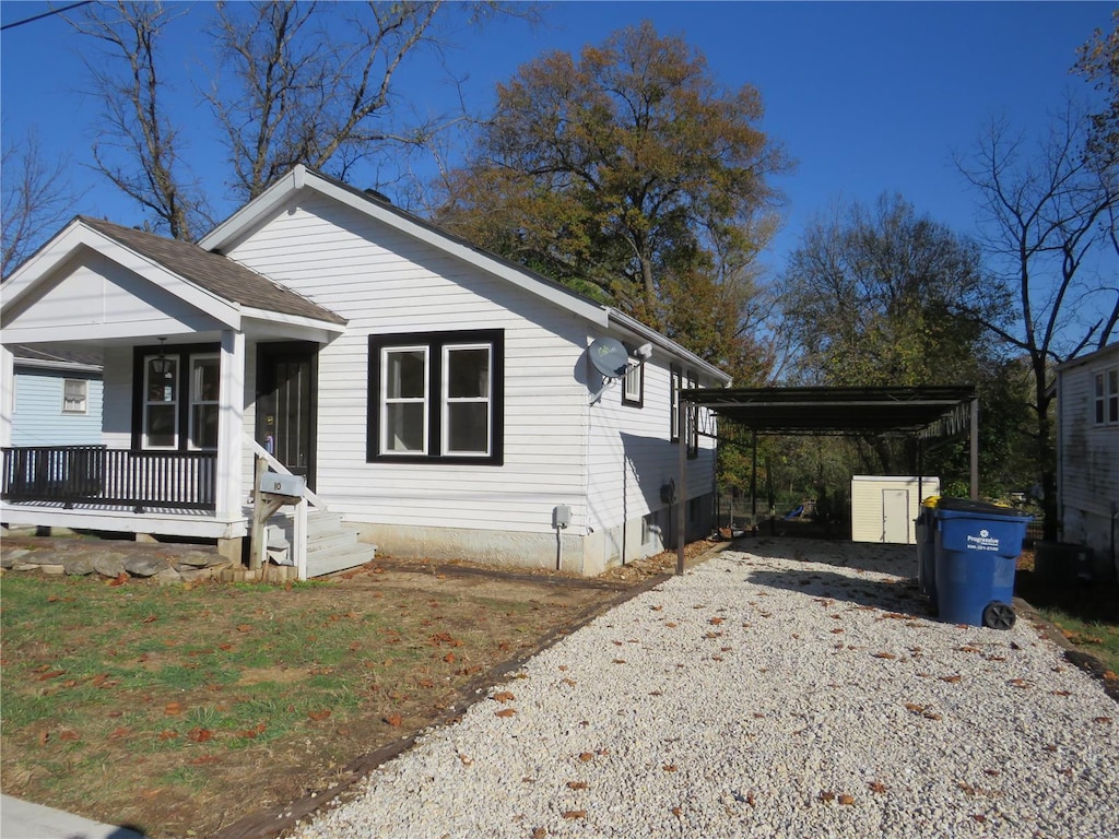 bungalow-style house with a carport