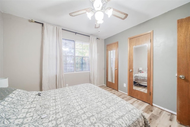 bedroom featuring light wood-type flooring and ceiling fan