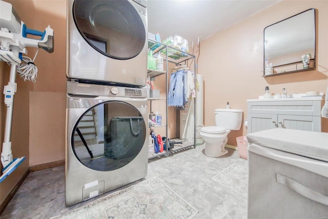 laundry area with stacked washer / dryer