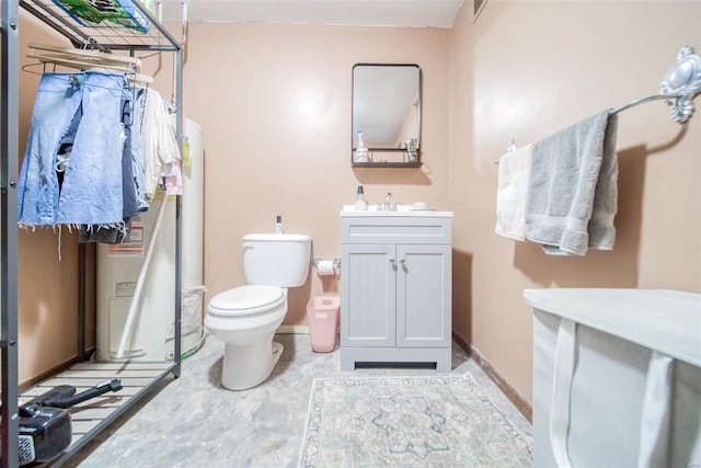 bathroom featuring toilet and vanity