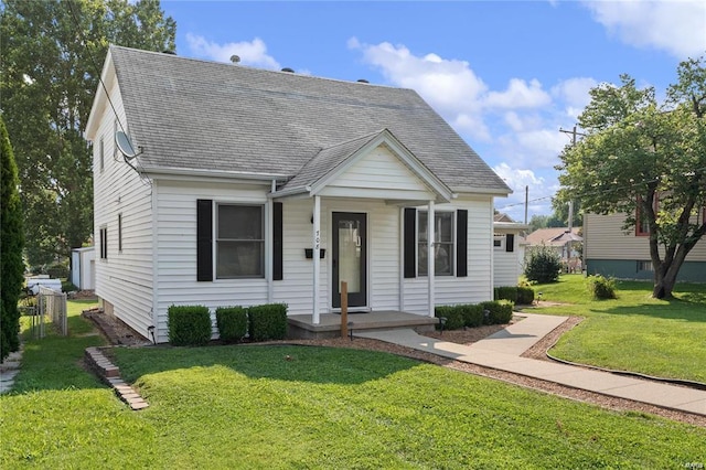 bungalow with a front yard