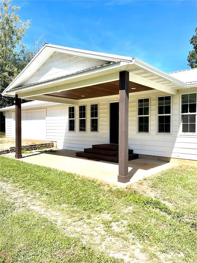 rear view of house featuring a patio area