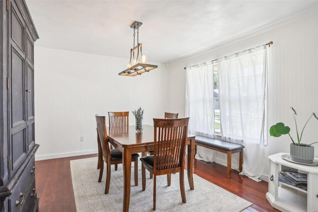 dining space featuring dark hardwood / wood-style flooring