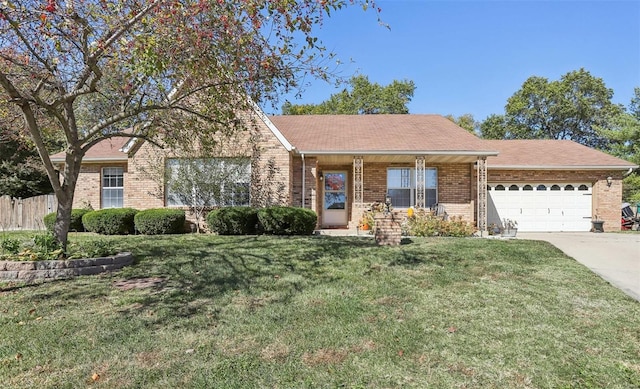 single story home with a front yard and a garage