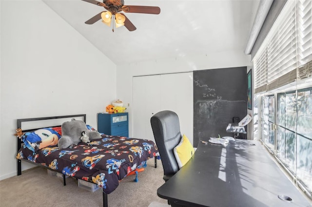 bedroom featuring lofted ceiling, carpet floors, and ceiling fan